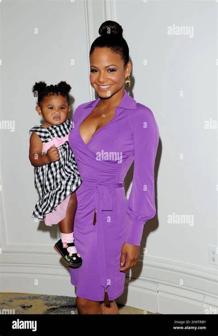 Christina Milian and Violet Madison ash in white gowns.